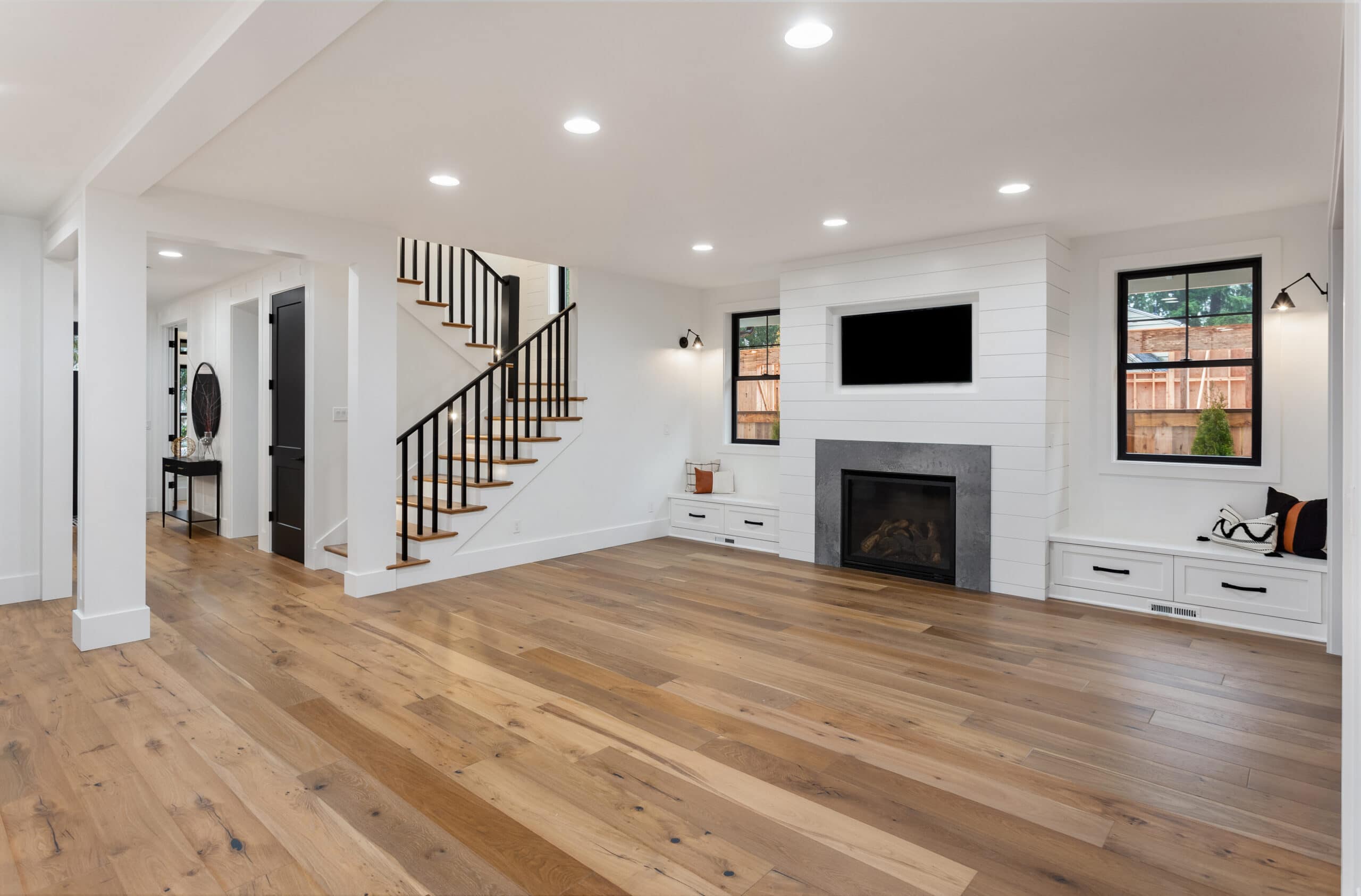 Beautiful white farmhouse style living room in new luxury home
